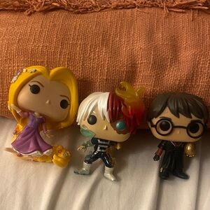 Funko Collectible Figures tangled and harry potter Set - Purple, Red, Black